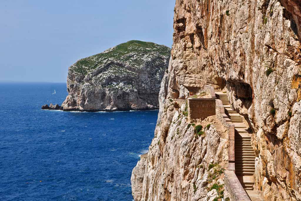 Stairways to stalactite cave of Neptune Grotto in Alghero in Sardinia